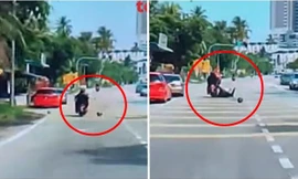 Quả dừa to rơi trúng đầu người đi xe máy ở Malaysia gây tai nạn, ai nhìn cũng choáng