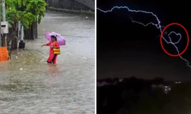 Tia sét kỳ ảo trong mưa: Sét đánh ngang bầu trời, uốn lượn tạo thành hình trái tim
