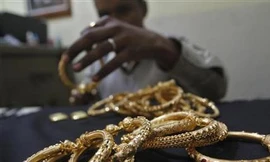 Vàng thế giới giảm, trong nước tăng