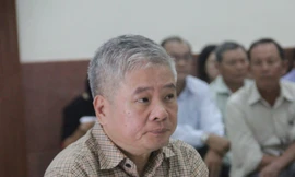 Nguyên phó Thống đốc Đặng Thanh Bình tại tòa sáng nay. Ảnh: Tân Châu