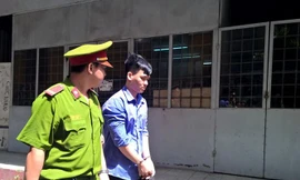 Huỳnh Thanh Phong tại phiên tòa ngày 13/6/2017. Ảnh: Tân Châu