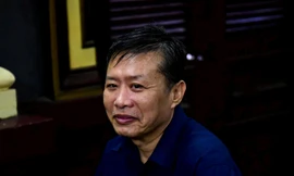 Cưu trung tá Nguyễn Hồng Ánh tại tòa. Ảnh: Tân Châu