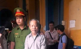 Ông Lê Quốc Cường trong lần ra tòa . Ảnh: Tân Châu.