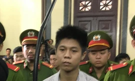 Nguyễn Hữu Tình - kẻ gây ra vụ thảm án rúng động cận tết vừa qua, nay bị tuyên án tử hình. Ảnh: Tân Châu