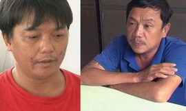 Trần Thanh Lộc (áo đỏ) và Vũ Minh Hùng tại cơ quan công an