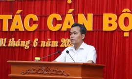 Ông Hồ Văn Niên phát biểu tại hội nghị