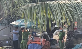 Lực lượng chức năng khám nghiệm điều tra vụ việc.