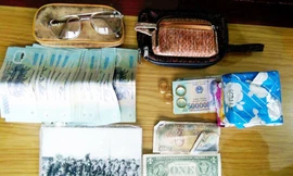 Tài sản trong túi xách mà Thượng úy Linh nhặt được.