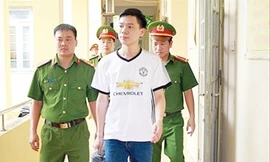 Bác sỹ Hoàng Công Lương hôm bị bắt tạm giam.