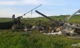 Hiện trường một chiếc trực thăng của Azerbaijan bị bắn rơi trên khu vực Armenia kiểm soát. (Ảnh: AFP)