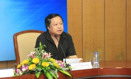 Nhạc sỹ Lương Minh trong cuộc họp báo giải Sao Mai 2015 tại Hà Nội. Ảnh: TL.