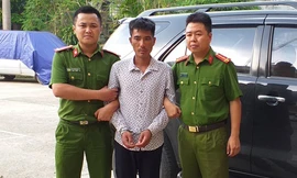 Cơ quan Công an dẫn giải đối tượng Nguyễn Tiến Giảng 