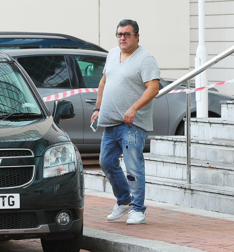 Mino Raiola và Mario Balotelli (ảnh trái). (Ảnh: Getty Images)