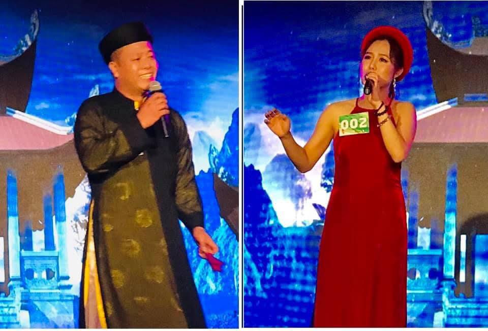 Hai thí sinh từ Đức (trái) và Hungary ở phần thi hát dân ca của cuộc thi hát “Tôi yêu tiếng nước tôi”.