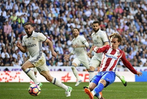 Griezmann giải cứu Atletico thoát thua Real