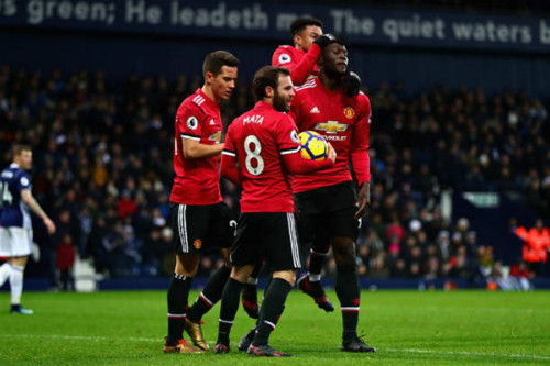 Khuôn mặt không biểu cảm của Lukaku sau khi ghi bàn. Ảnh: Reuters. 