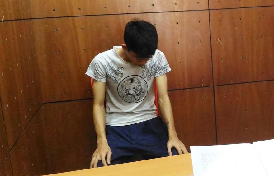 Nghi can tại cơ quan điều tra. Ảnh CA