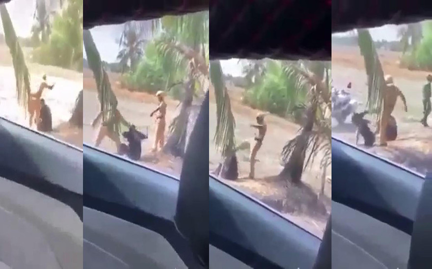 Hình ảnh hai người mặc sắc phục CSGT tát, đá hai thanh niên.