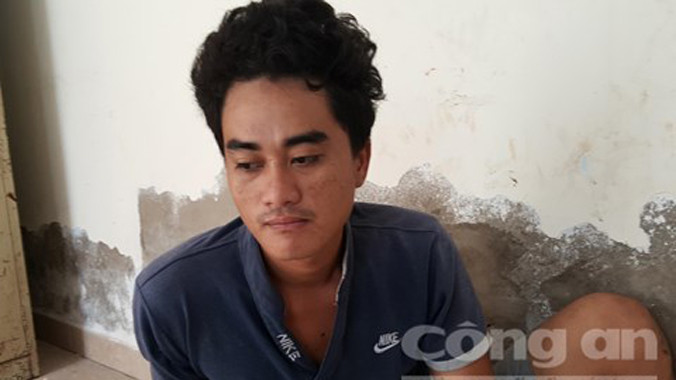 Đối tượng Nguyễn Văn Bình tại cơ quan công an - Ảnh: Tuấn Thành