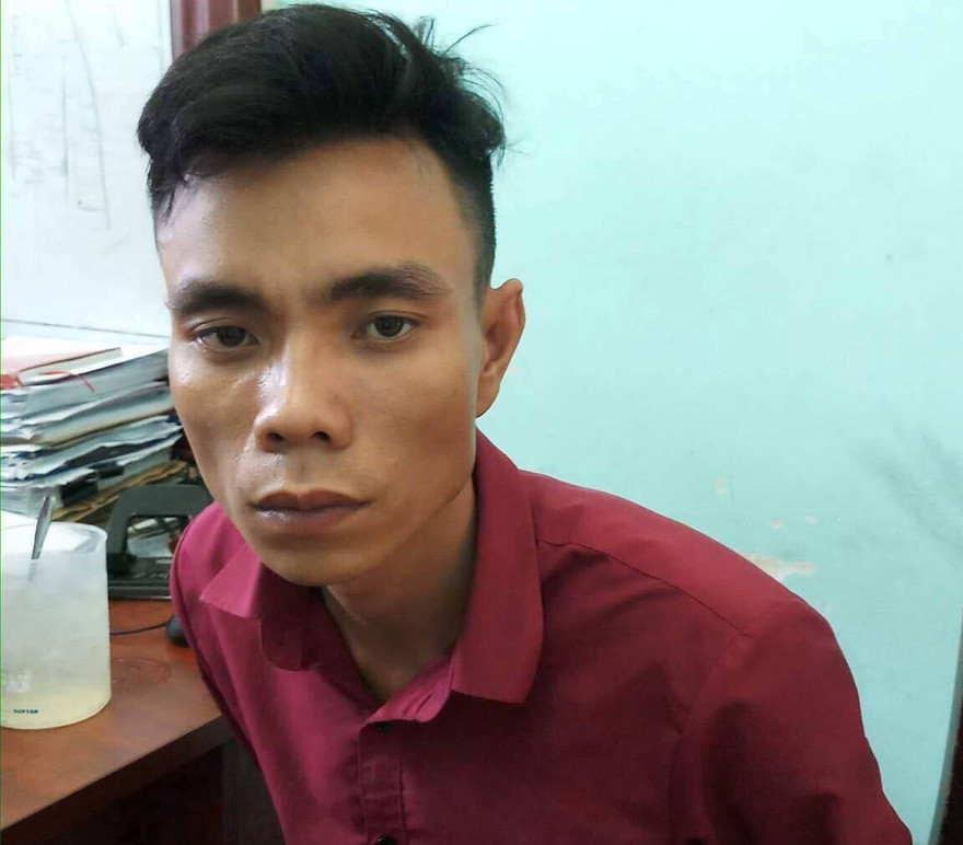 Bùi Đình Hùng tại công an.