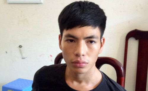 Nguyễn Văn Tuấn tại cơ quan công an. Ảnh: Quang Bình.