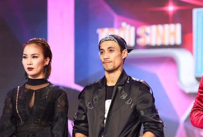 Phạm Lịch và huấn luyện viên Phạm Anh Khoa trong gameshow truyền hình.