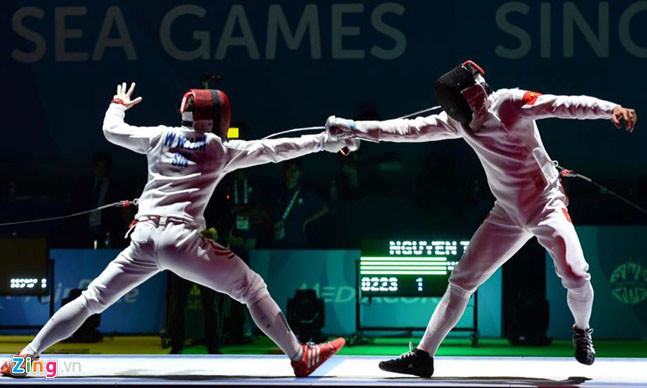 Tiến Nhật (phải) mang về tấm HCV đầu tiên cho đoàn Thể thao Việt Nam tại SEA Games 28. Ảnh: Zing