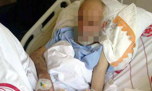 ông Turgut Oym... tại bệnh viện.