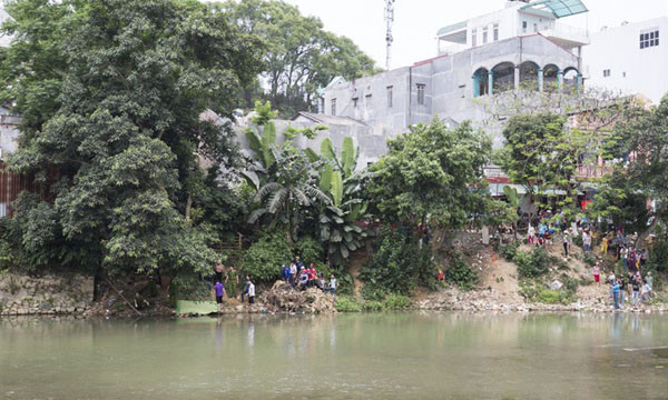 Hiện trường thi thể nữ trôi sông. Ảnh: Báo Cao Bằng.