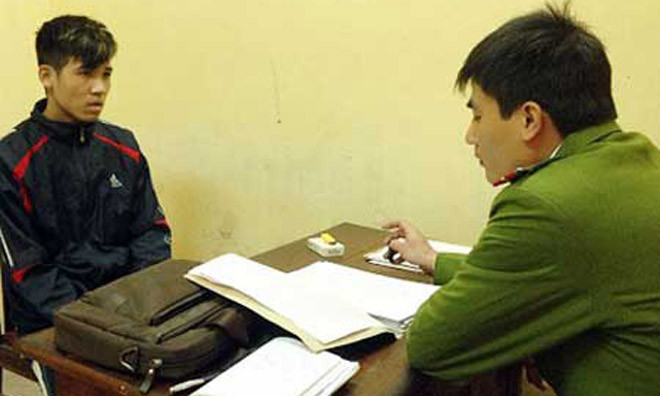 Đối tượng Nguyễn Đức Hưng tại cơ quan điều tra. 