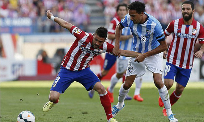 Atletico Madrid của Villa (trái) vẫn chưa thể đăng quang.