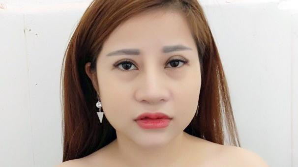 Quách Thị Thắm tại cơ quan công an.