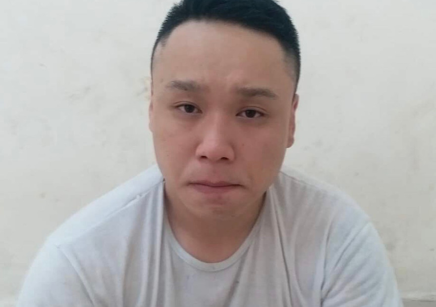 Tạ Khắc Huy tại công an.