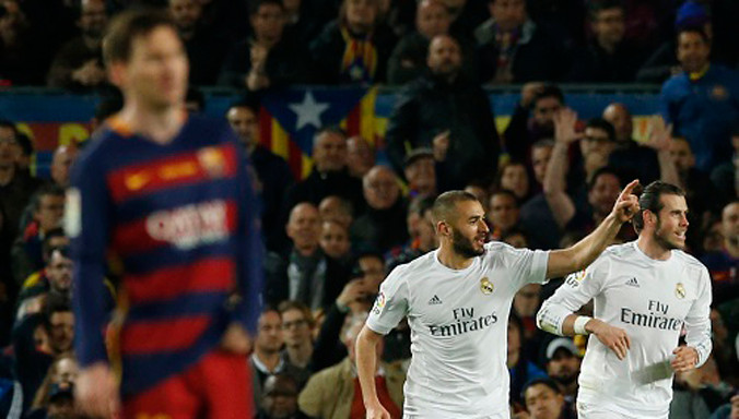 Messi mờ nhạt trước những cầu thủ ngôi sao của Real. Ảnh: Reuters.