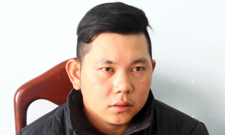 Nghi can Trương Minh Hùng tại cơ quan điều tra.