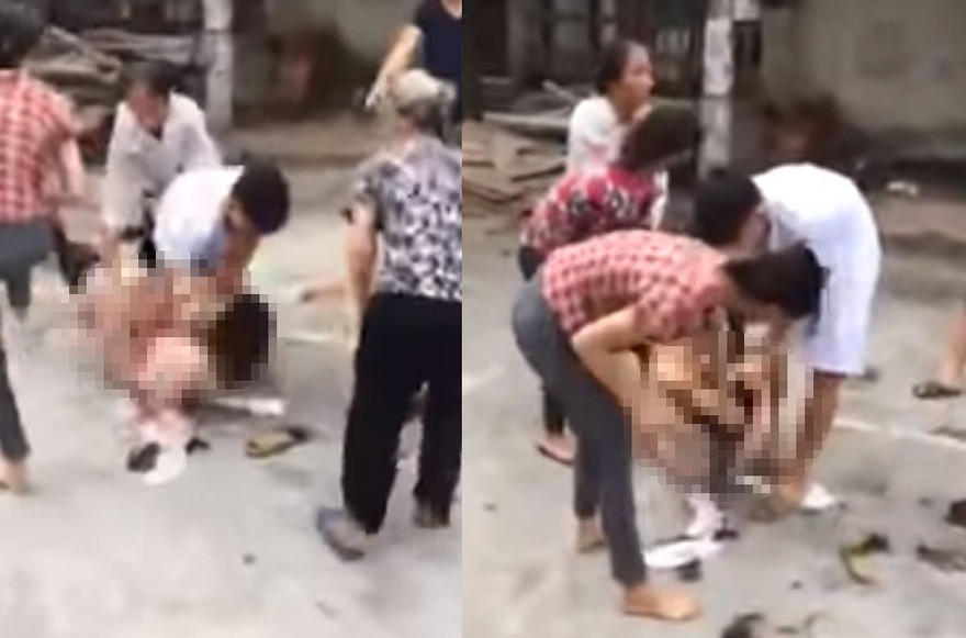 Nhóm người đánh ghen ở Vĩnh Phúc. Ảnh: Cắt từ clip