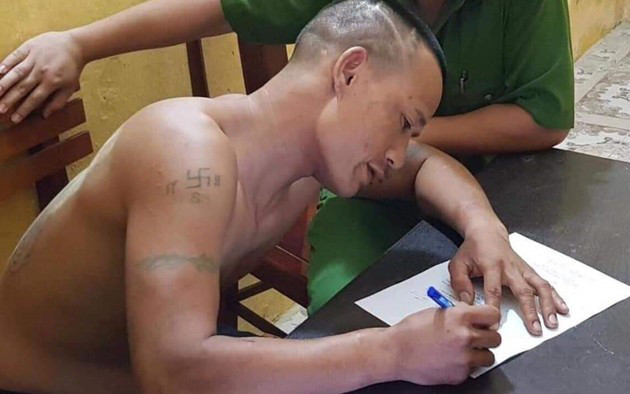 Đối tượng Hỷ tại công an. 