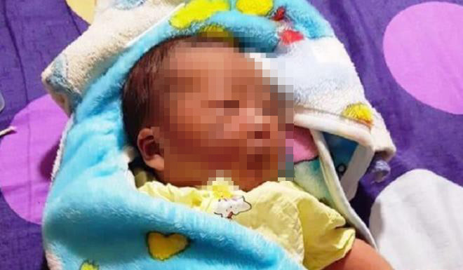 Bé sơ sinh bị bỏ rơi ở cánh đồng. 