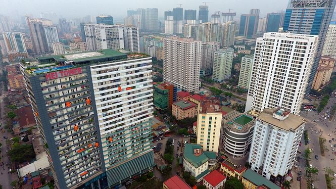 Hạ tầng khu vực nội đô ngày càng quá tải sau 10 năm mở rộng địa giới hành chính - Ảnh: Hoàng Mạnh Thắng