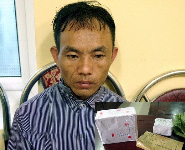 Dùng súng, lựu đạn phòng thân khi mang heroin qua biên giới