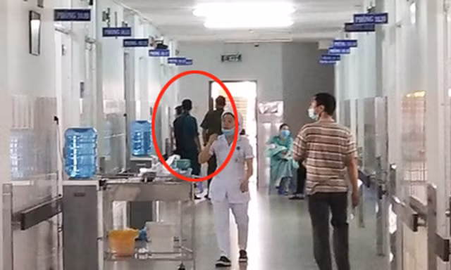 Nhiều cán bộ công an đang canh phòng trước phòng điều trị của ông Hoàng Văn Trường