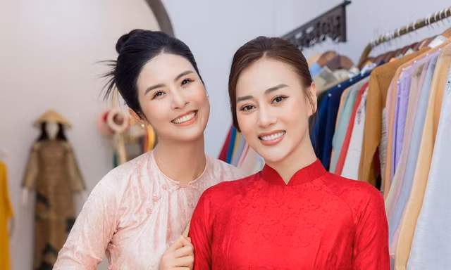 Phương Oanh chọn mặc áo dài do Hoa hậu Ngọc Hân thiết kế cho ngày trọng đại