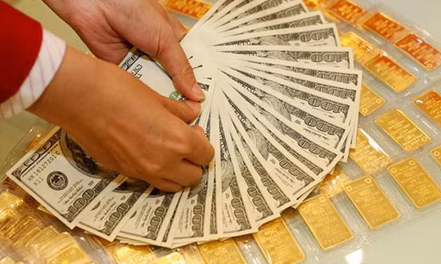 Giá vàng quay đầu giảm, USD tiếp tục tăng. (Ảnh ST) 