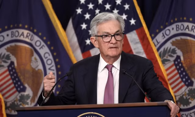 Sau khi hạ lãi suất, Chủ tịch Fed nói 'không từ chức' nếu ông Trump yêu cầu