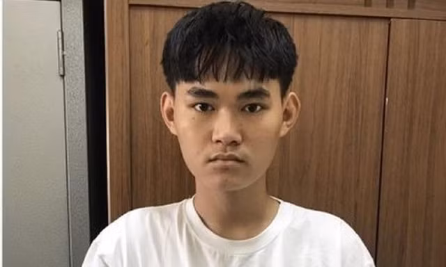 Nguyễn Thanh Bình tại cơ quan công an.