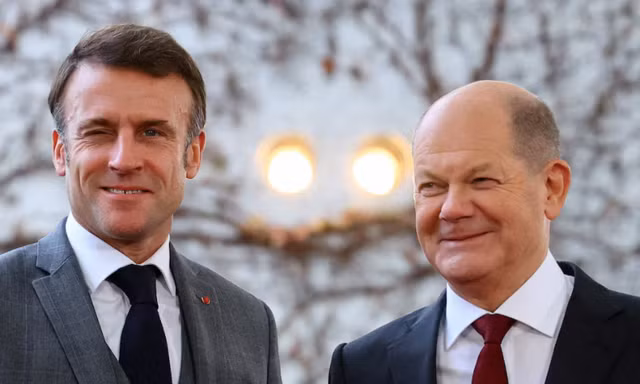 Tổng thống Pháp Emmanuel Macron và Thủ tướng Đức Olaf Scholz. (Ảnh: Reuters)