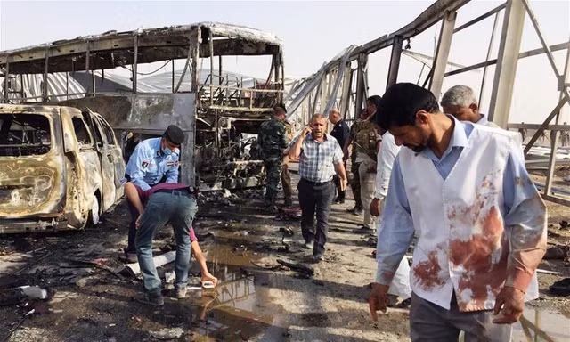 Hiện trường vụ đánh bom xe ở trạm kiểm soát ở Fadak, tỉnh Dhi Qar, Iraq. Ảnh: Tân Hoa Xã