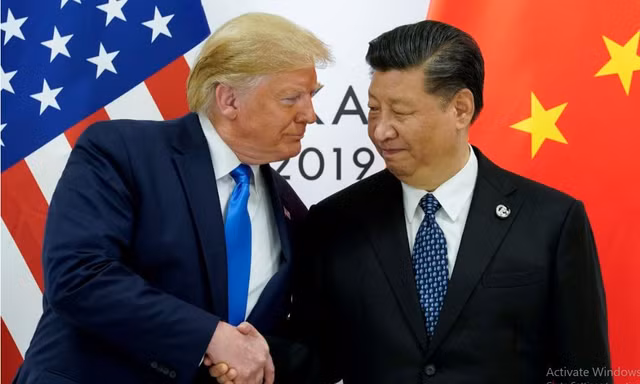Ông Trump nói đã lên kế hoạch điện đàm với ông Tập. ảnh: Reuters/SCMP 