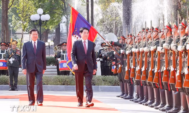 Lễ đón chính thức Chủ tịch nước Lương Cường thăm cấp Nhà nước đến Lào