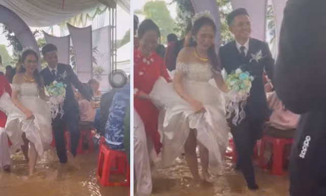 Cô dâu chú rể bì bõm lội nước tiếp khách trong nước lũ